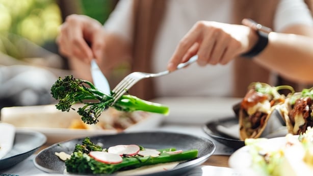 woman eating organic salad