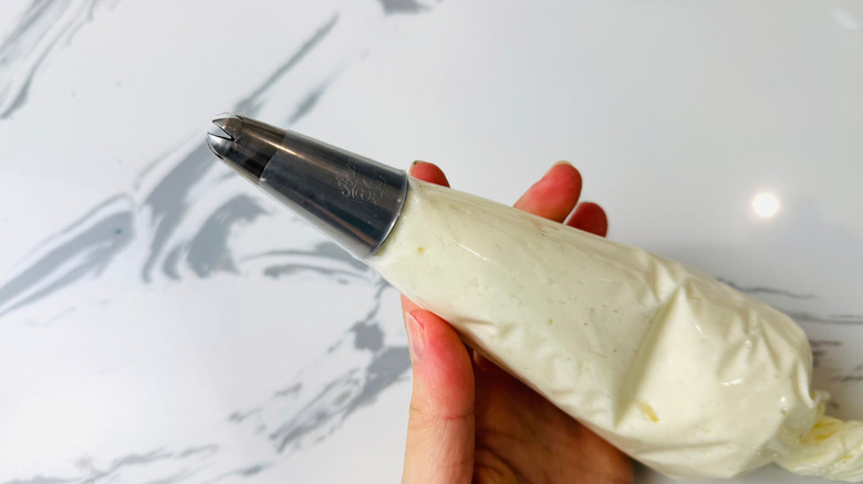 Frosting in piping bag with star tip