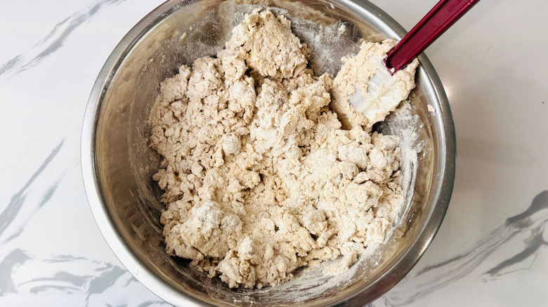 Shaggy biscuit dough in bowl