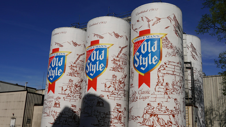 Iconic Old Style Beer brewery silos in La Crosse, Wisconsin under blue sky.