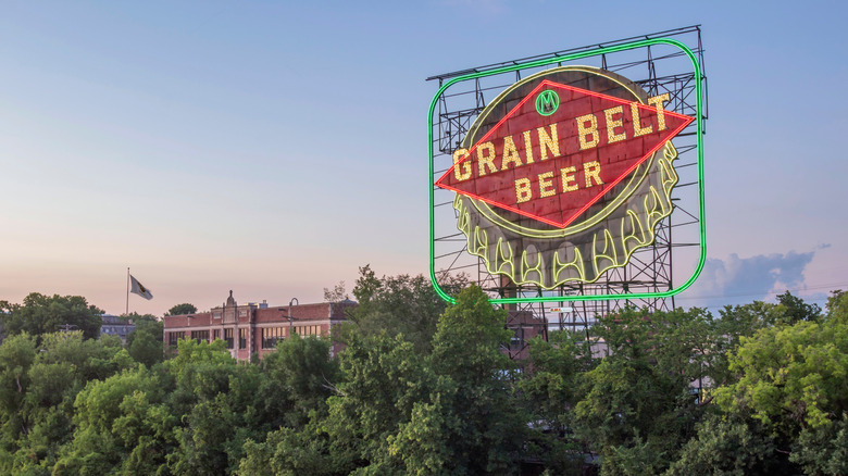 A Close Up Shot of the Iconic Grain Belt Sign Illuminated over the Mississippi River.