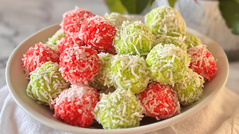 Christmas-themed red and green Jell-O balls in bowl