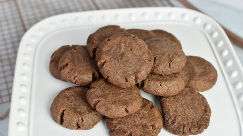 Pile of Nutella cookies on white plate