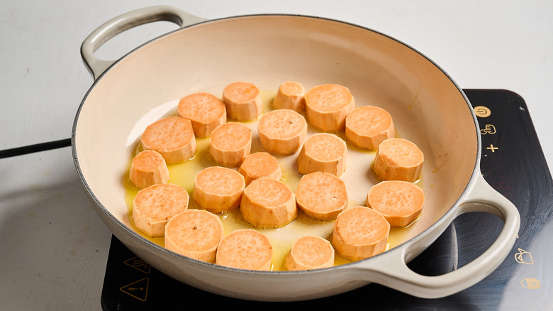 searing potatoes in a pan