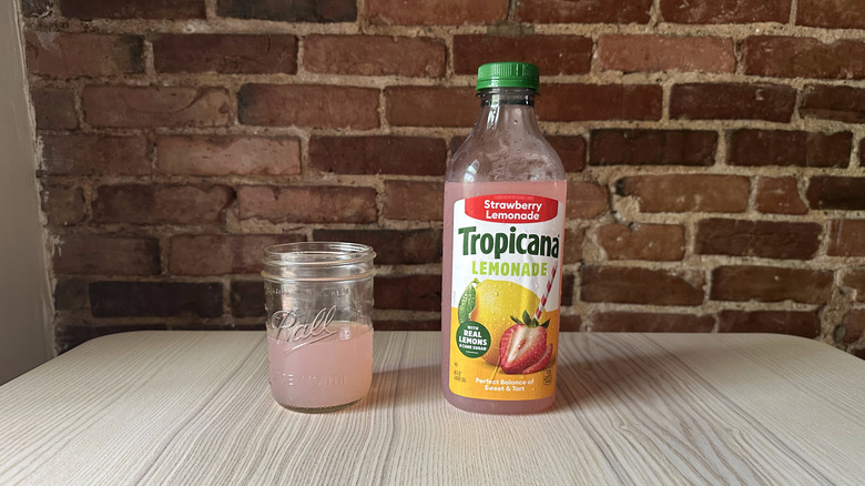 Tropicana Strawberry Lemonade with brick background