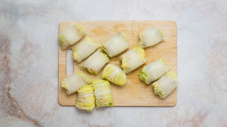 cabbage rolls on wooden board
