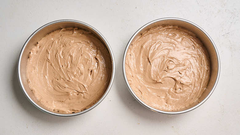 Cakes poured into cake pans
