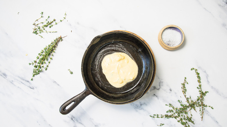 Pancake in cast iron pan.