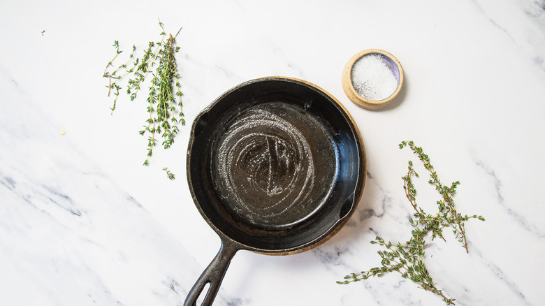 Cast iron pan with butter.