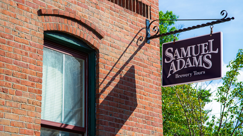 Sam Adams brewery tours sign on corner of brick building