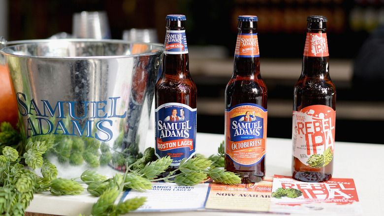 Sam Adams ice bucket and three bottles of beer