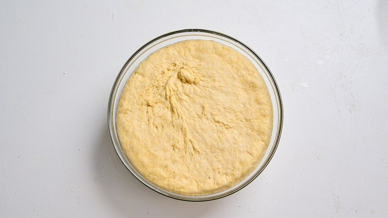 proofed dough in a large bowl