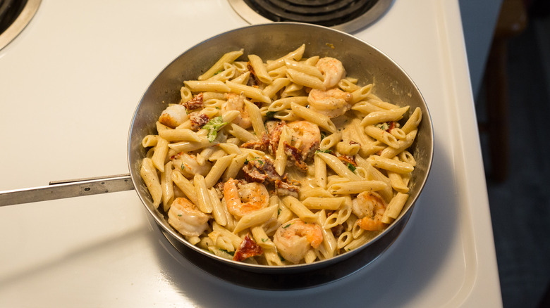 broth simmering in frying pan