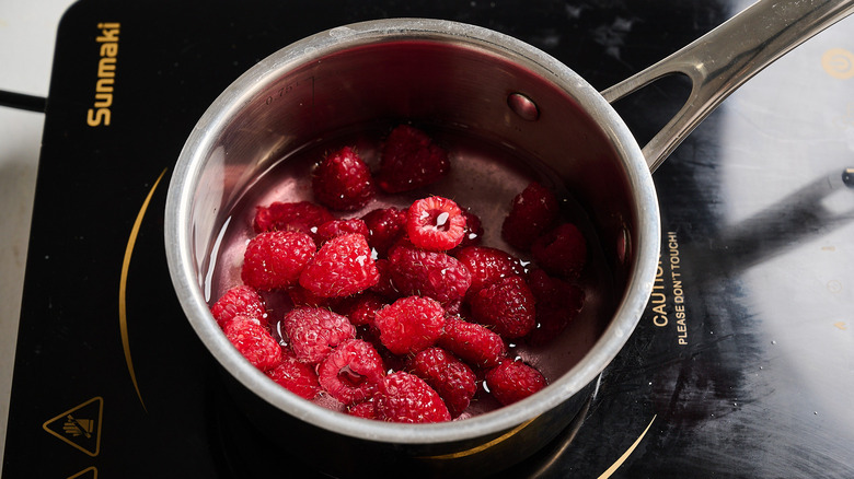 raspberry juice ingredients in a saucepan
