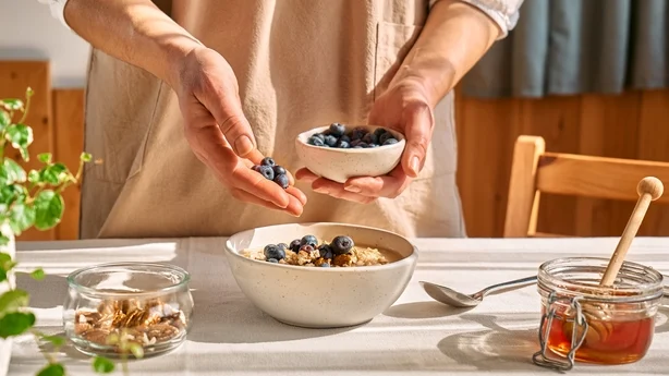 Woman preparing healthy dieting vegan nutritious breakfast