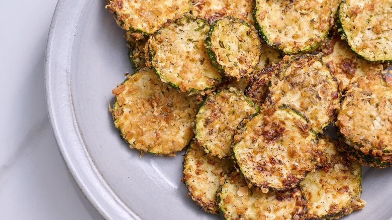 3-Ingredient Air Fryer Zucchini Chips on white plate