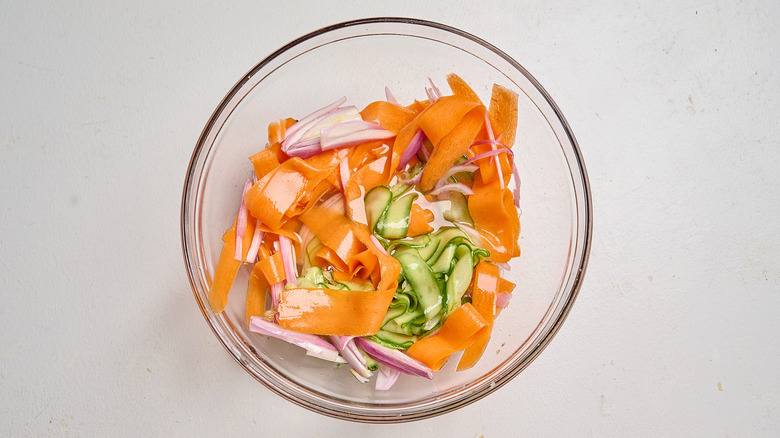 vinegar poured over cucumbers and carrots