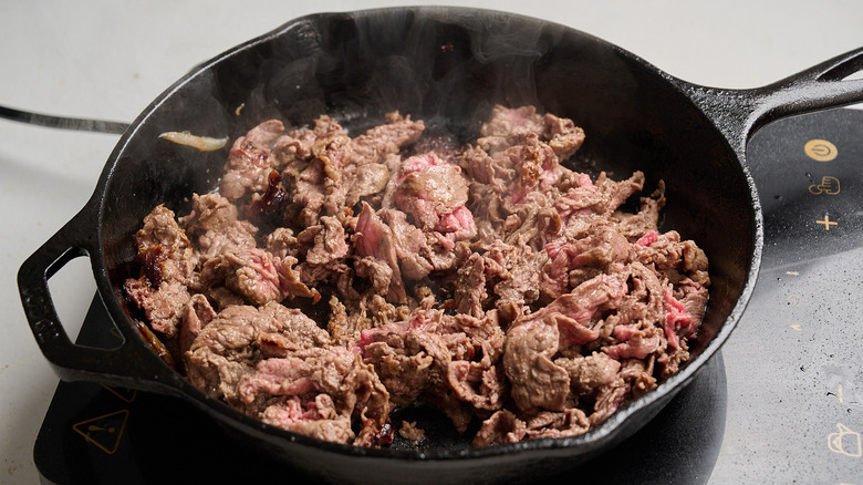browned beef in a skillet
