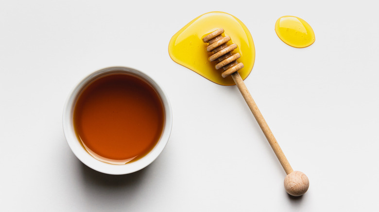 Honey in white bowl