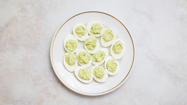 deviled eggs on white plate