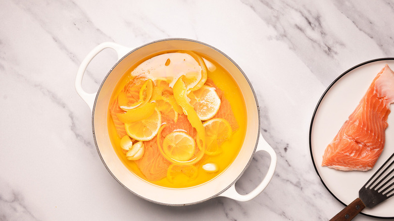 Salmon in poaching oil.