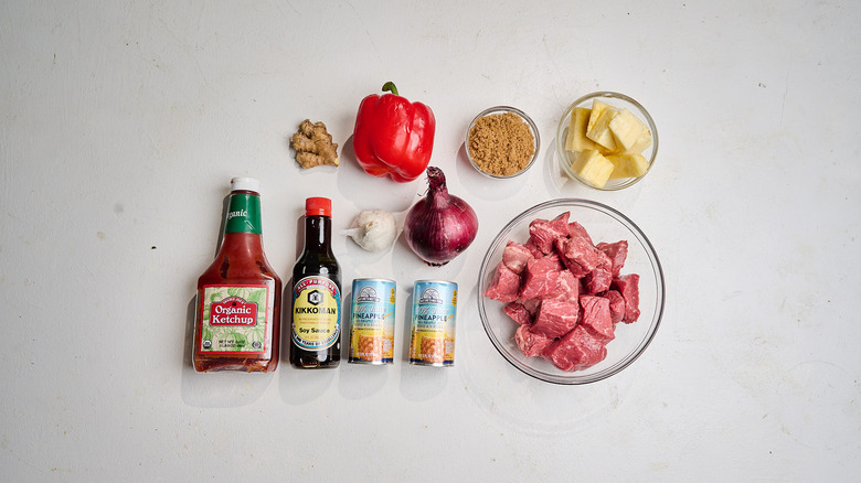Hawaiian-style teriyaki beef kabob ingredients on a table