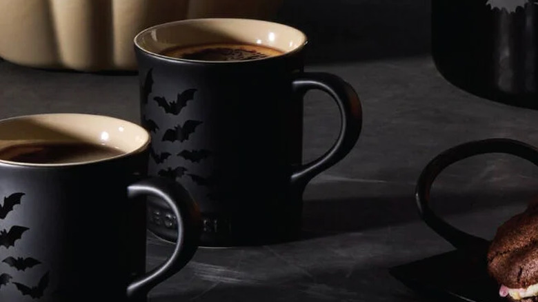 Two Bat Mugs filled with coffee.