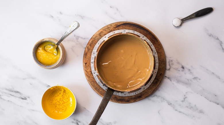 Lemon curd caramel in saucepan