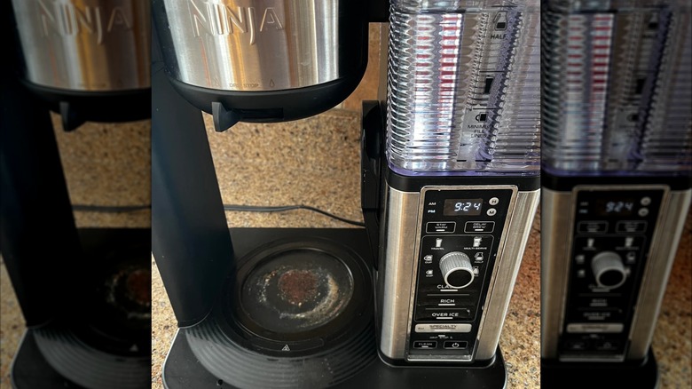 A Ninja coffee maker with a rust hot plate.