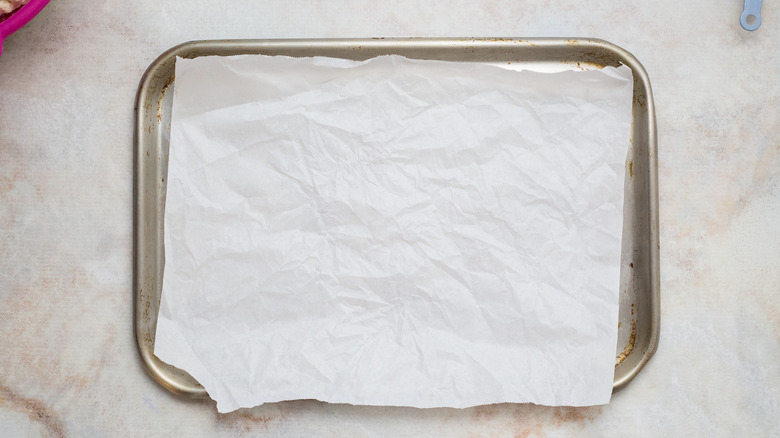 lined baking sheet on table