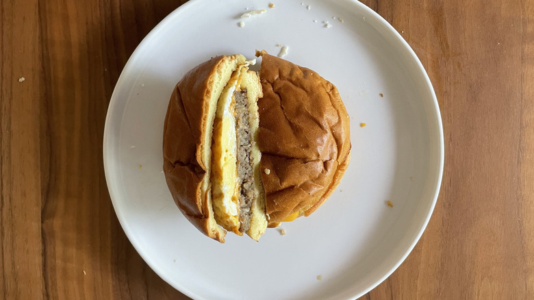 Brioche sausage breakfast sandwich on a plate