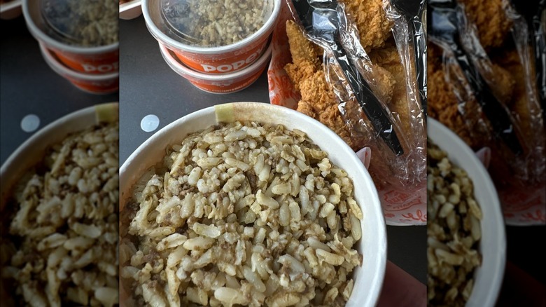 Cajun rice with Popeyes chicken and other sides