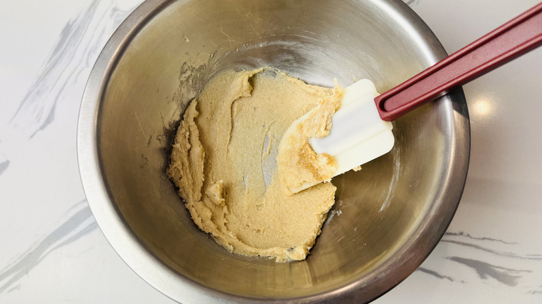 Butter and sugar in a mixing bowl