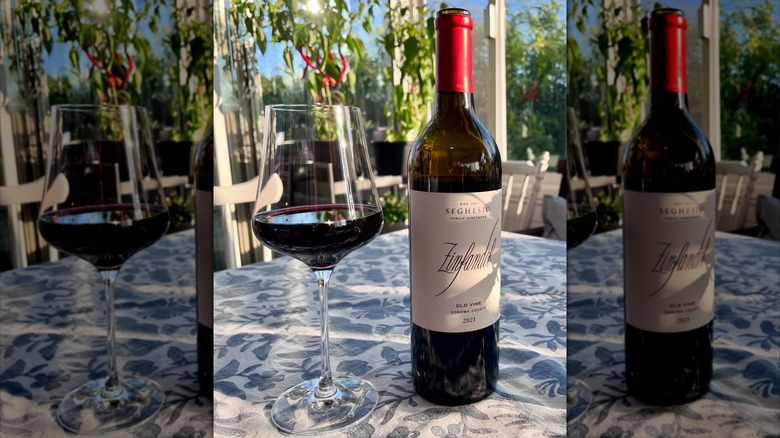bottle and glass of red wine