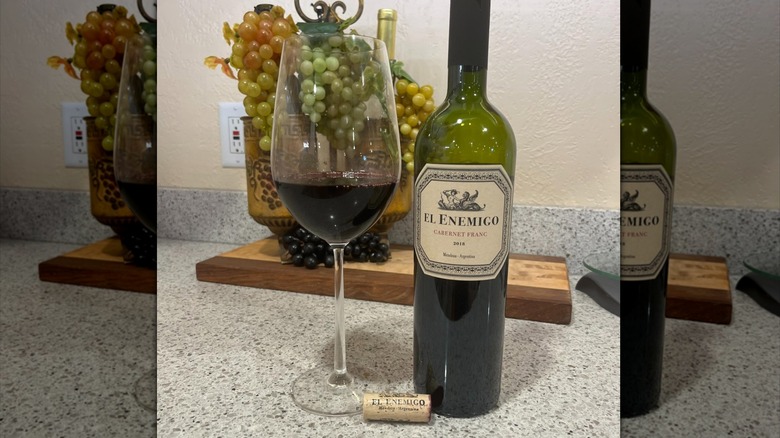 bottle and glass of red wine