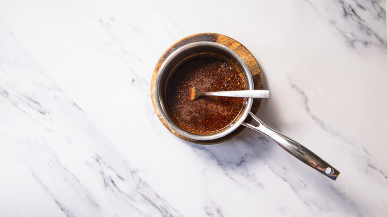 Uncooked hot Nashville paste in saucepan