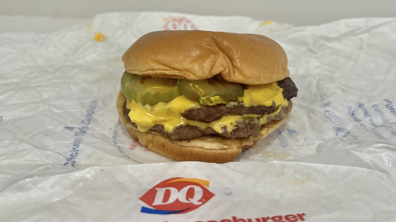 Dairy Queen Double Original Cheeseburger Signature Stackburger on wrapper.