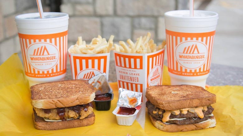 Several menu items from Whataburger on a table