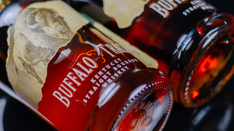 A close-up of two bottles of Buffalo Trace laid side by side