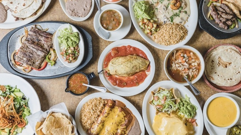 Top down view of array of Mexican dishes on table at Lopez Mexican Restaurant