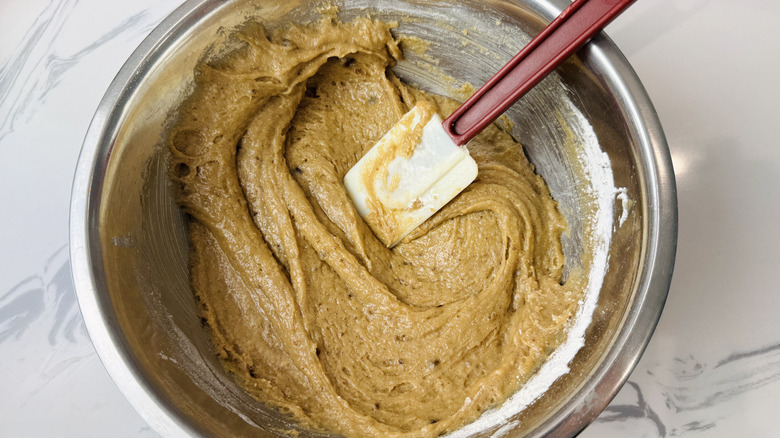 Blondie batter in bowl with rubber spatula
