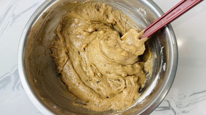 Blondie batter with walnuts in bowl