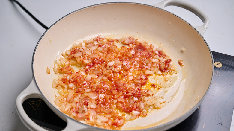 tomato paste stirred into onion and garlic