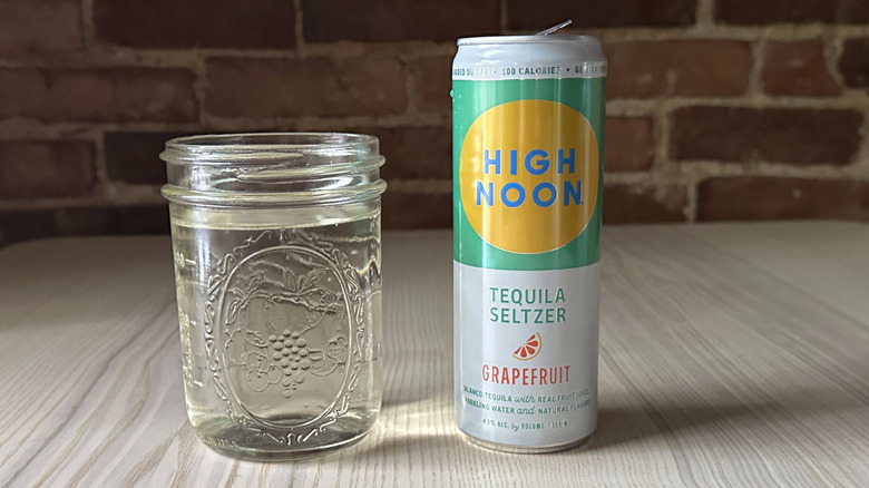Grapefruit High Noon on table with glass