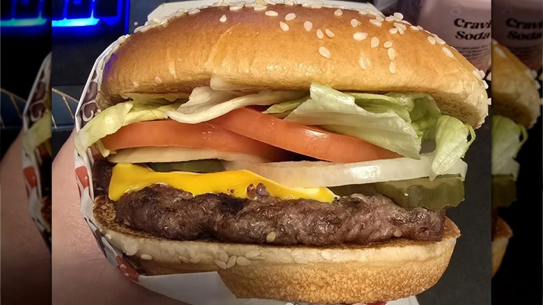 Hand holding Burger King's new Whopper