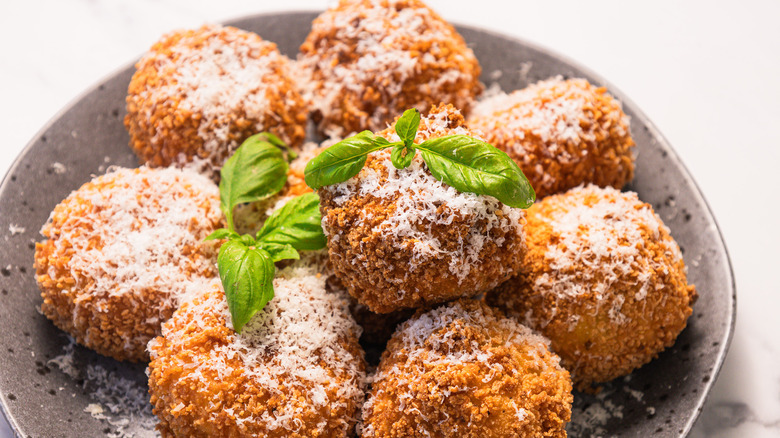 Close up on plate with arancini