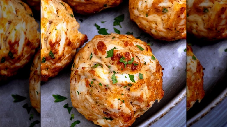 Crab cakes in metal tray