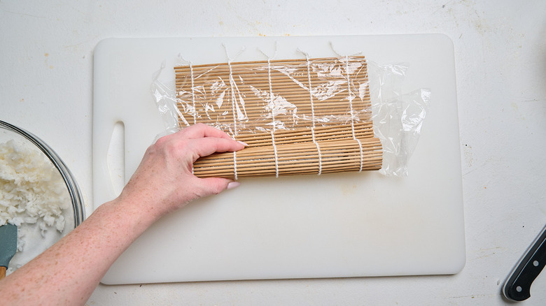 rolling sushi with bamboo mat