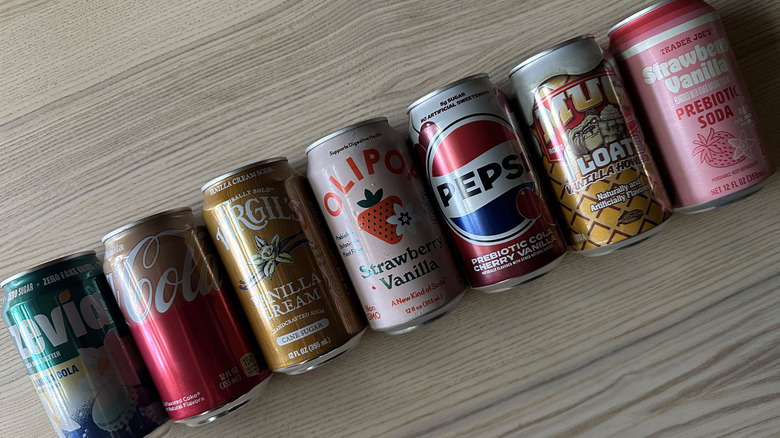 Vanilla-flavored sodas on wooden table