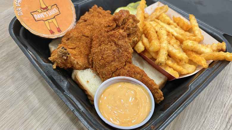Dave's Hot Chicken sauce with chicken tenders meal